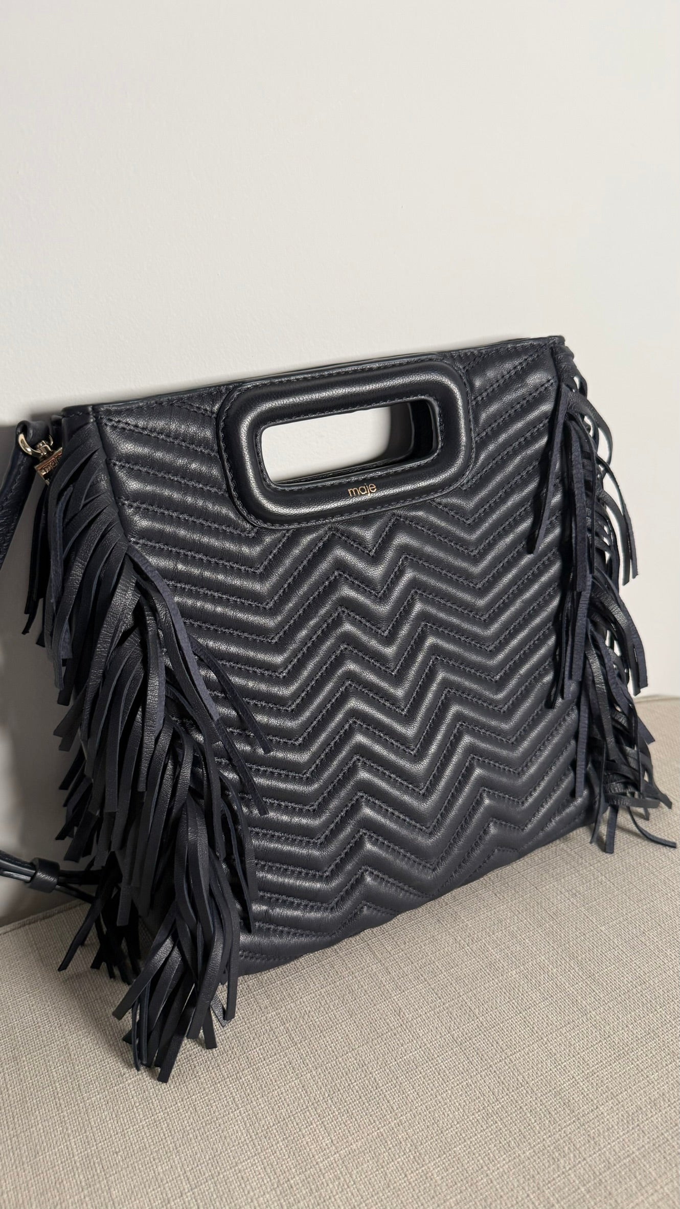 MAJE - Sac M en cuir matelassé à franges